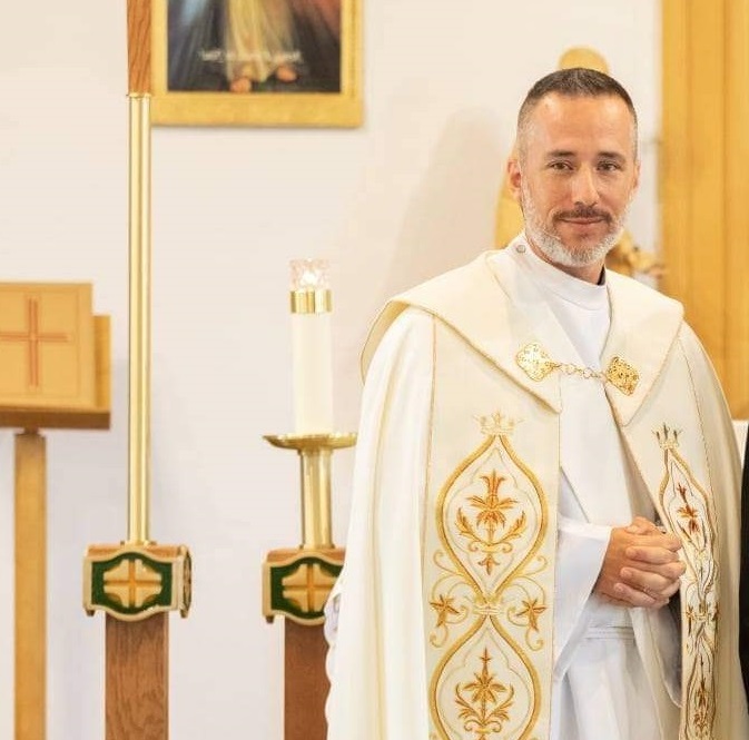 Deacon Ryan Sales in liturgical vestments